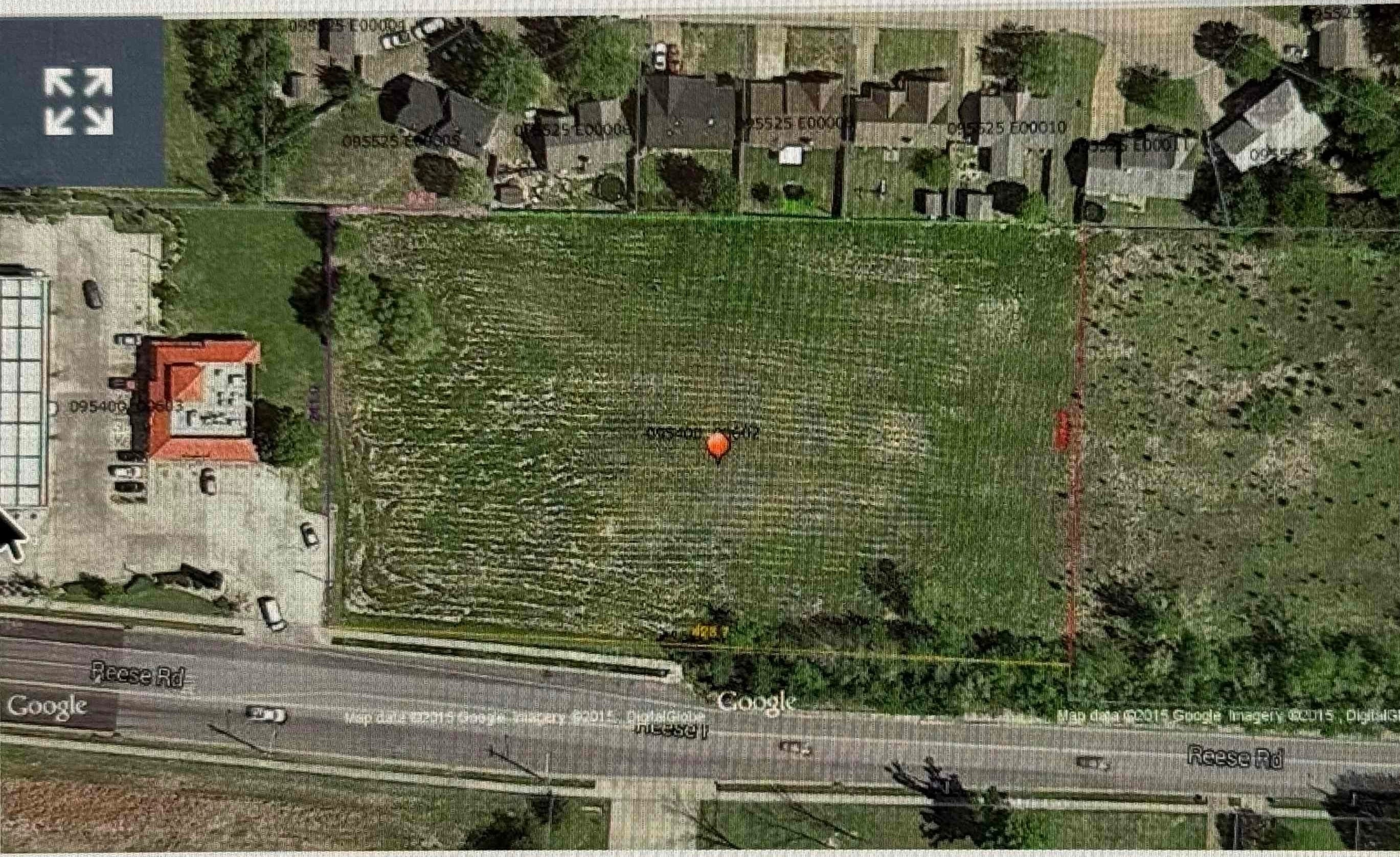 Reese Road Memphis, TN 38133 - Photo 3 of 3 an aerial view of residential houses with outdoor space and street view