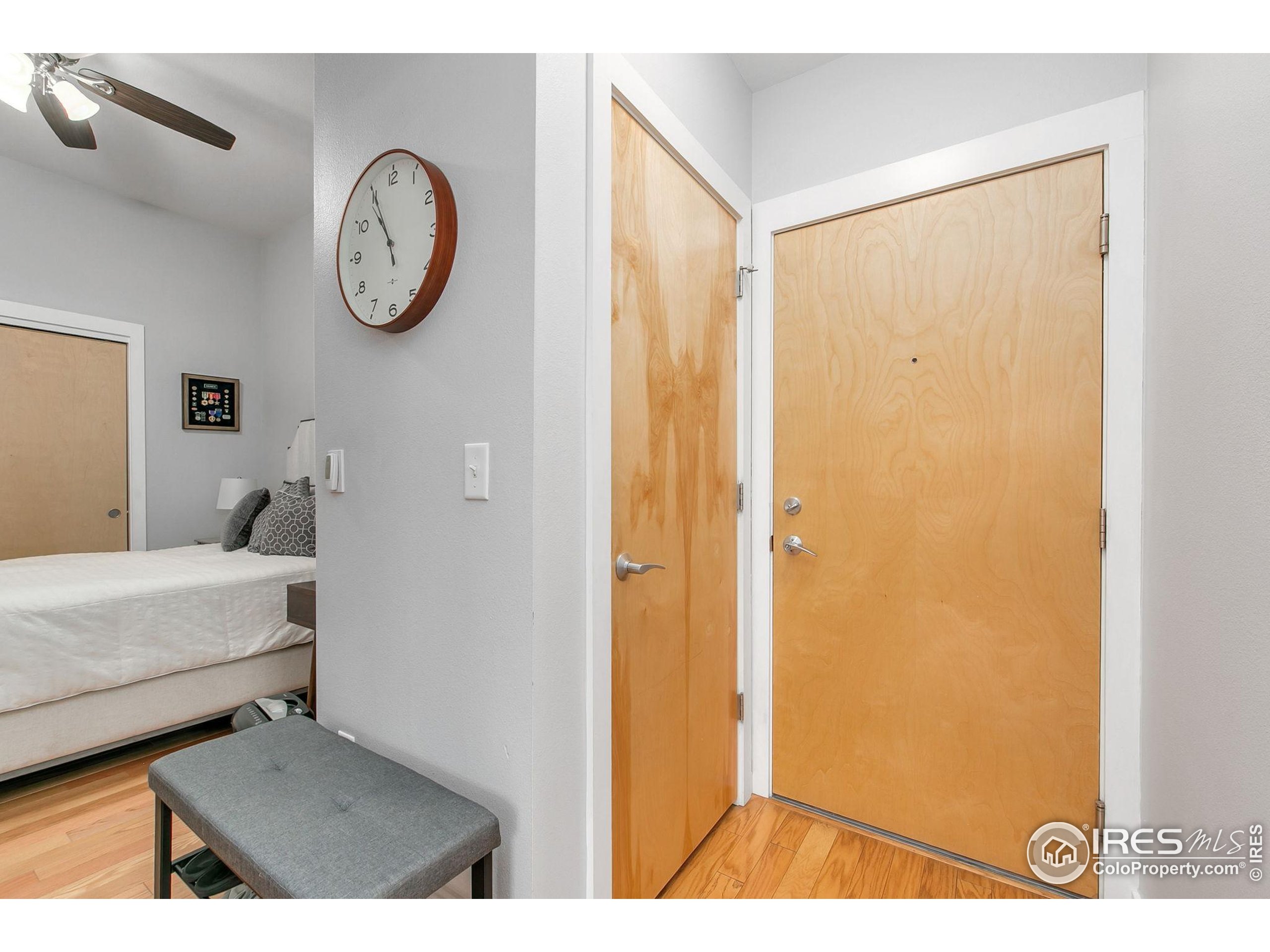 204 Maple Street, Unit 207 Fort Collins, CO 80521 - Photo 5 of 21 a view of a room with wooden floor