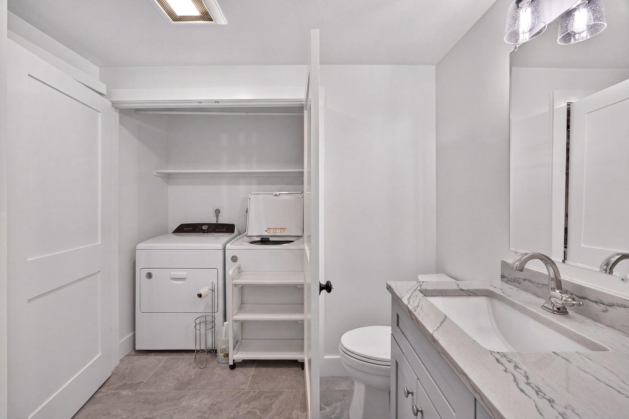 35 Debs Hill Road, Unit 35 Yarmouth Port, MA 02675 - Photo 23 of 36 a bathroom with a sink toilet vanity and tub