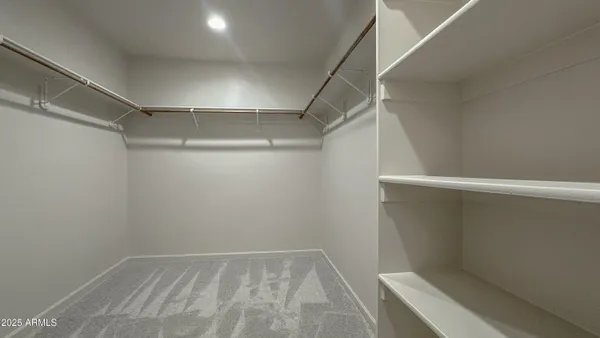 a view of an empty walk in closet