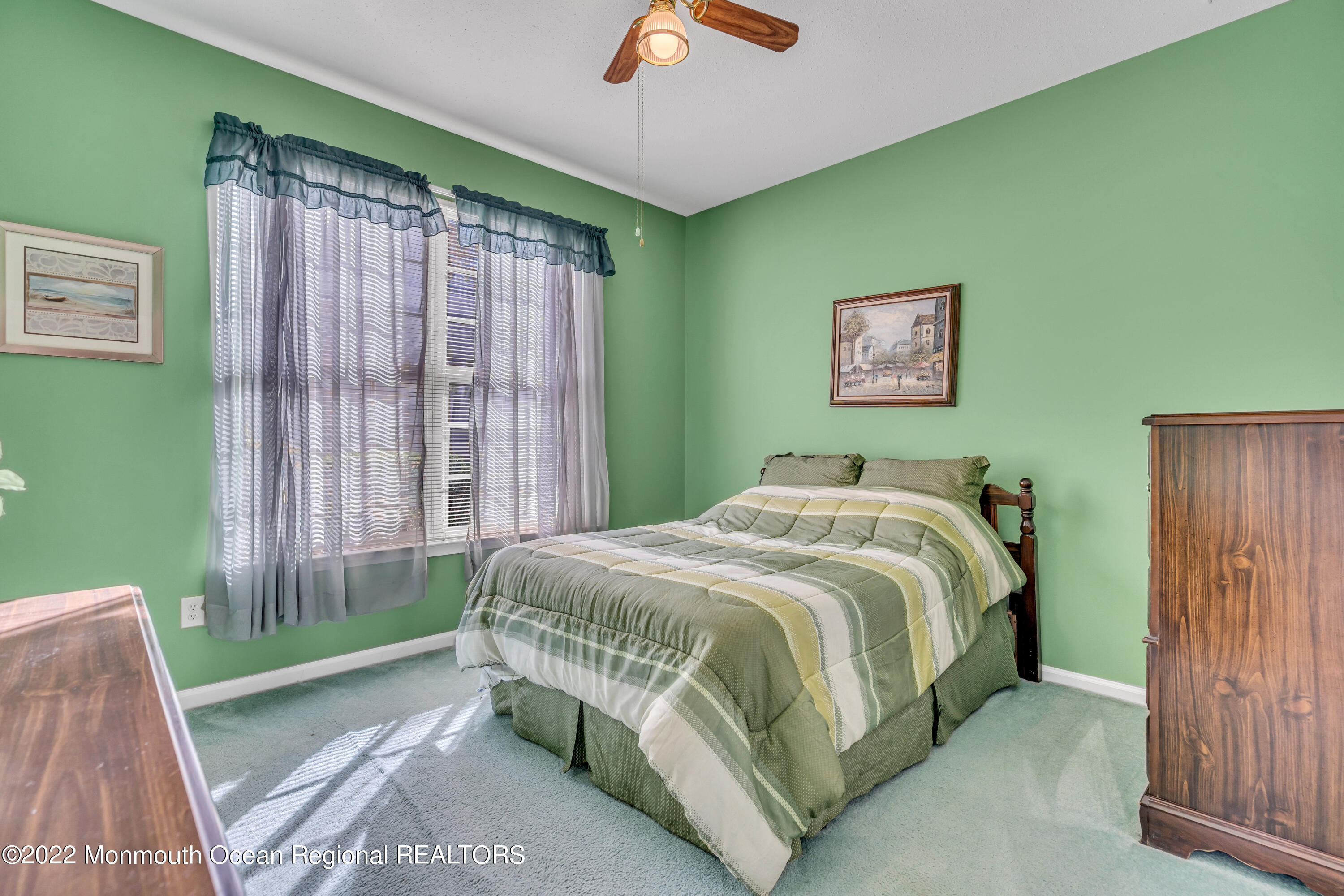 59 Quail Road Barnegat, NJ 08005 - Photo 24 of 30 a bedroom with a bed and a painting on the wall