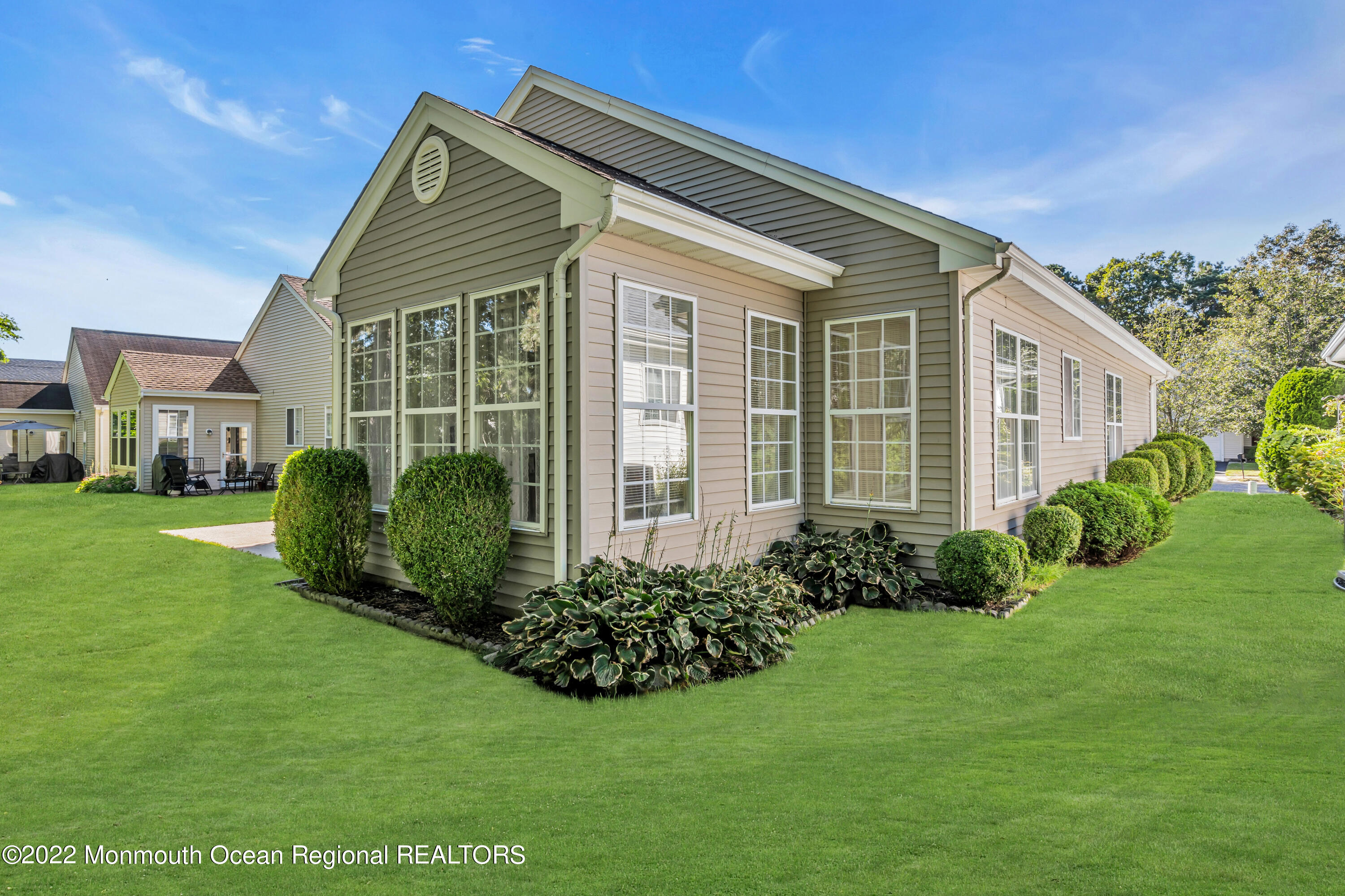 59 Quail Road Barnegat, NJ 08005 - Photo 26 of 30 a front view of a house with garden
