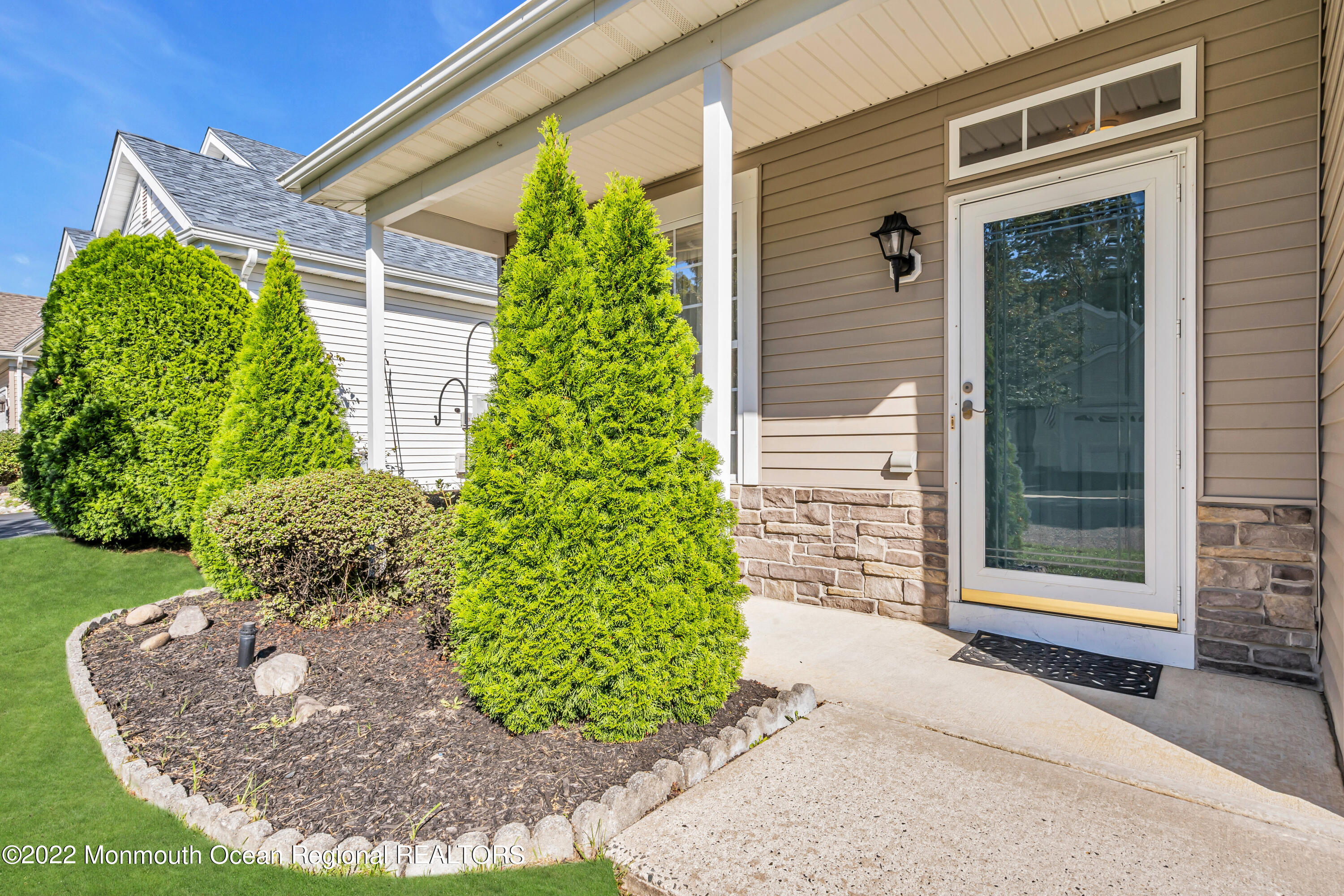 59 Quail Road Barnegat, NJ 08005 - Photo 4 of 30 a front view of a house with garden