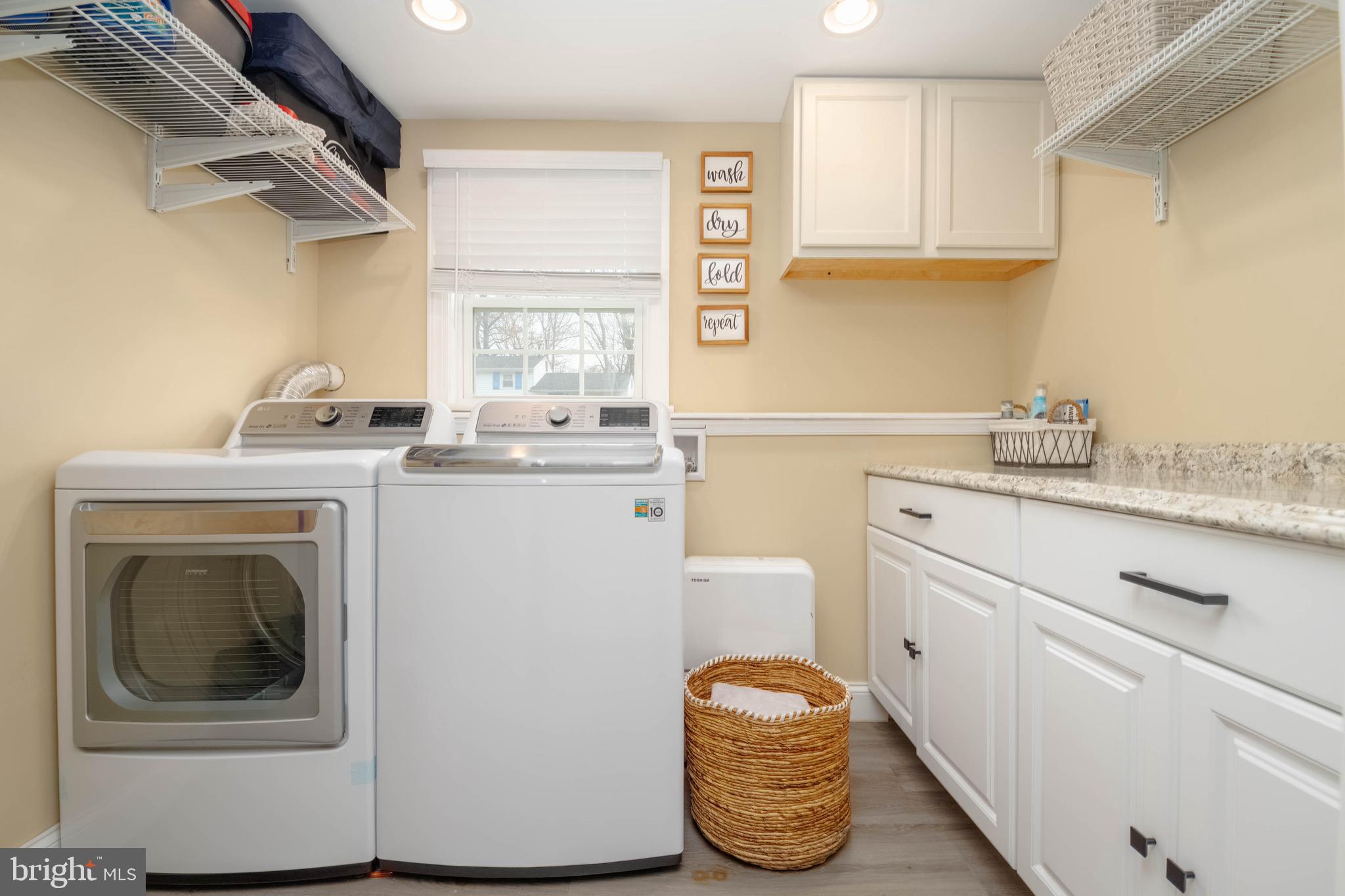 438 Chestnut Street Aberdeen, MD 21001 - Photo 15 of 28 a utility room with sink dryer and washer