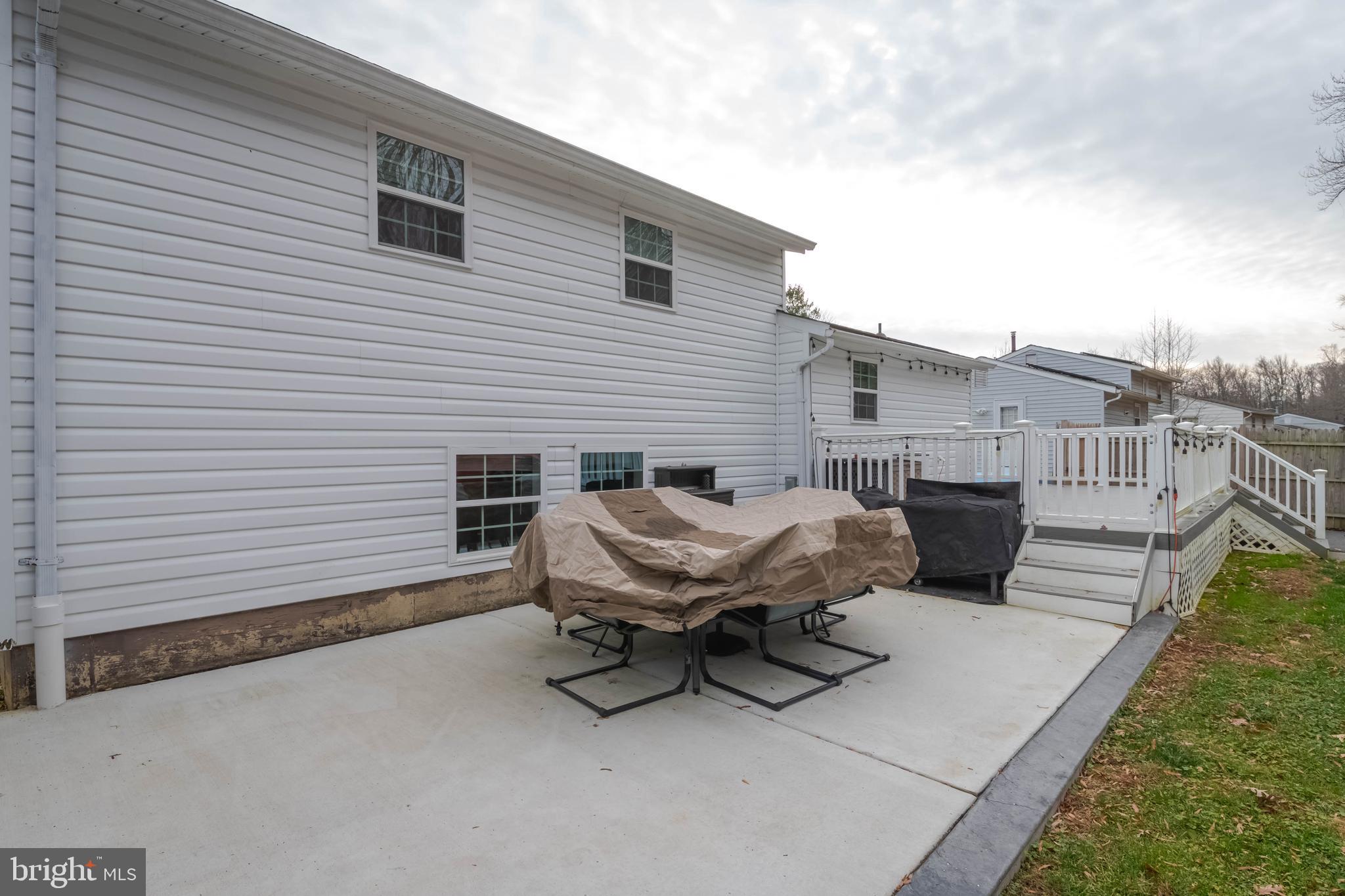 438 Chestnut Street Aberdeen, MD 21001 - Photo 19 of 28 a view of a patio with a table and chairs