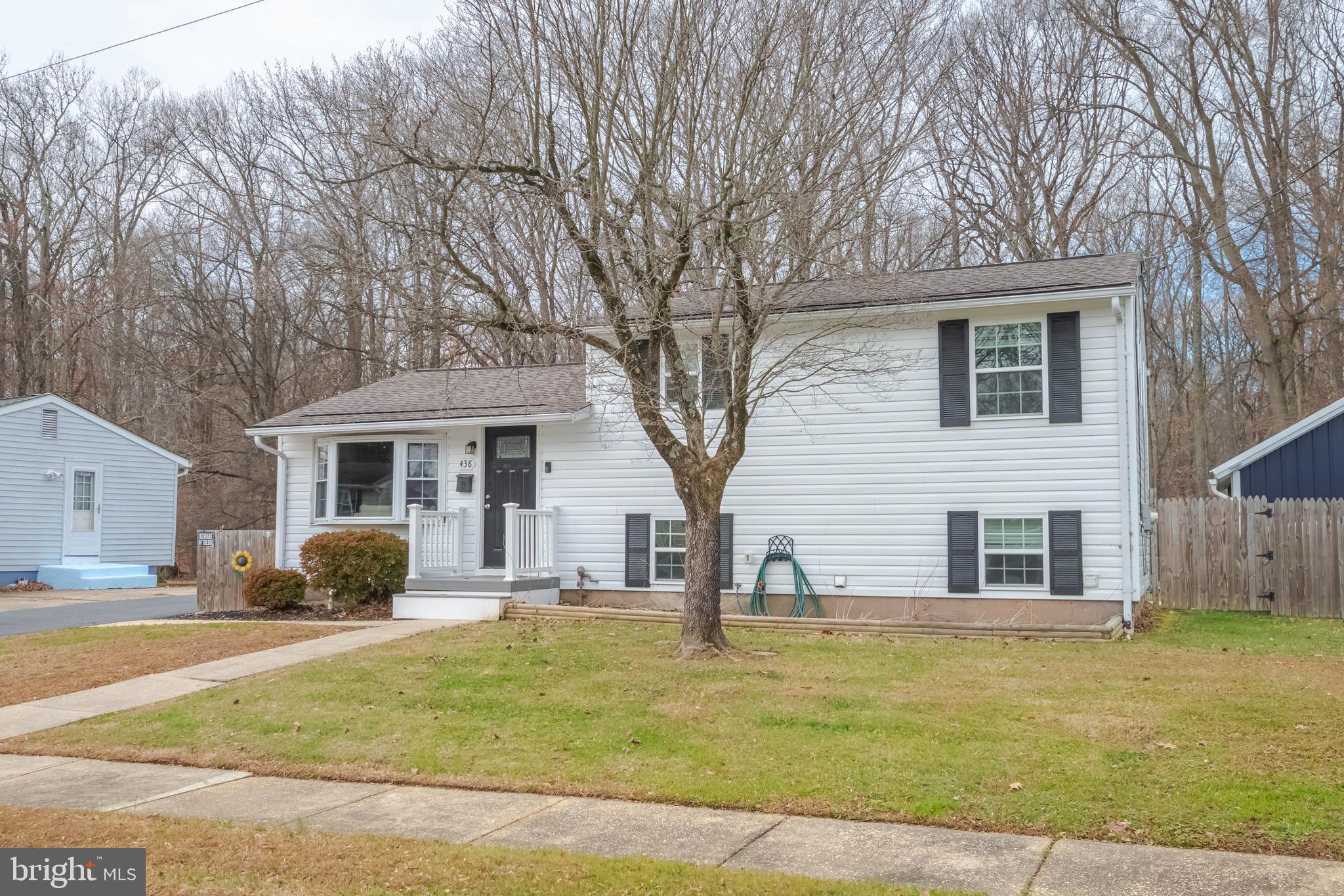 438 Chestnut Street Aberdeen, MD 21001 - Photo 2 of 28 a front view of a house with a yard
