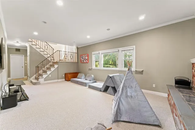 a bed room with furniture and a window