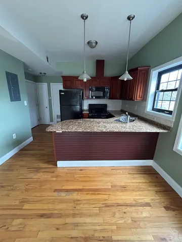 a swimming pool with view of living room