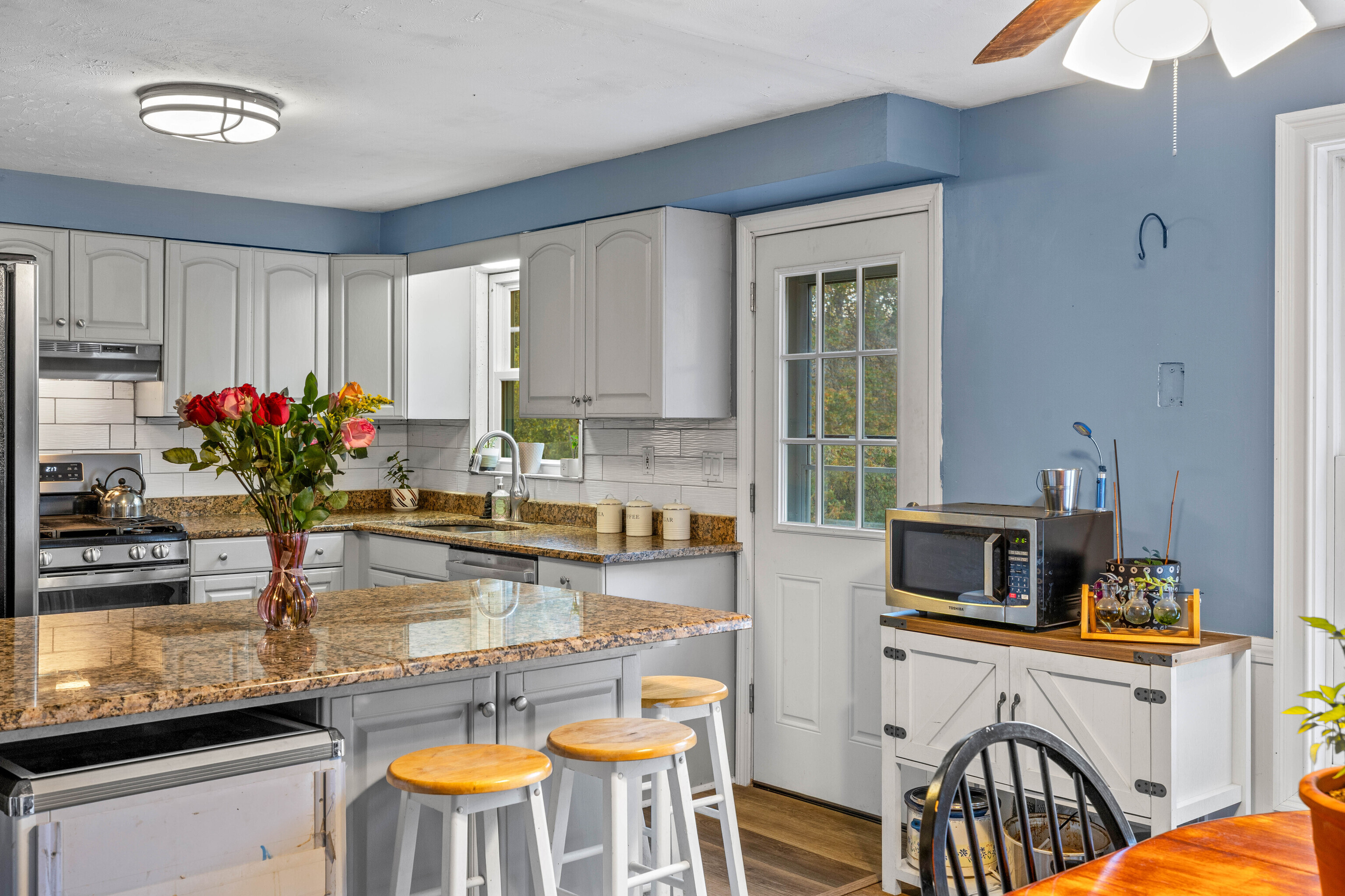 4 Van Dyke Lane Clinton, CT 06413 - Photo 13 of 38 a kitchen with a refrigerator and a sink