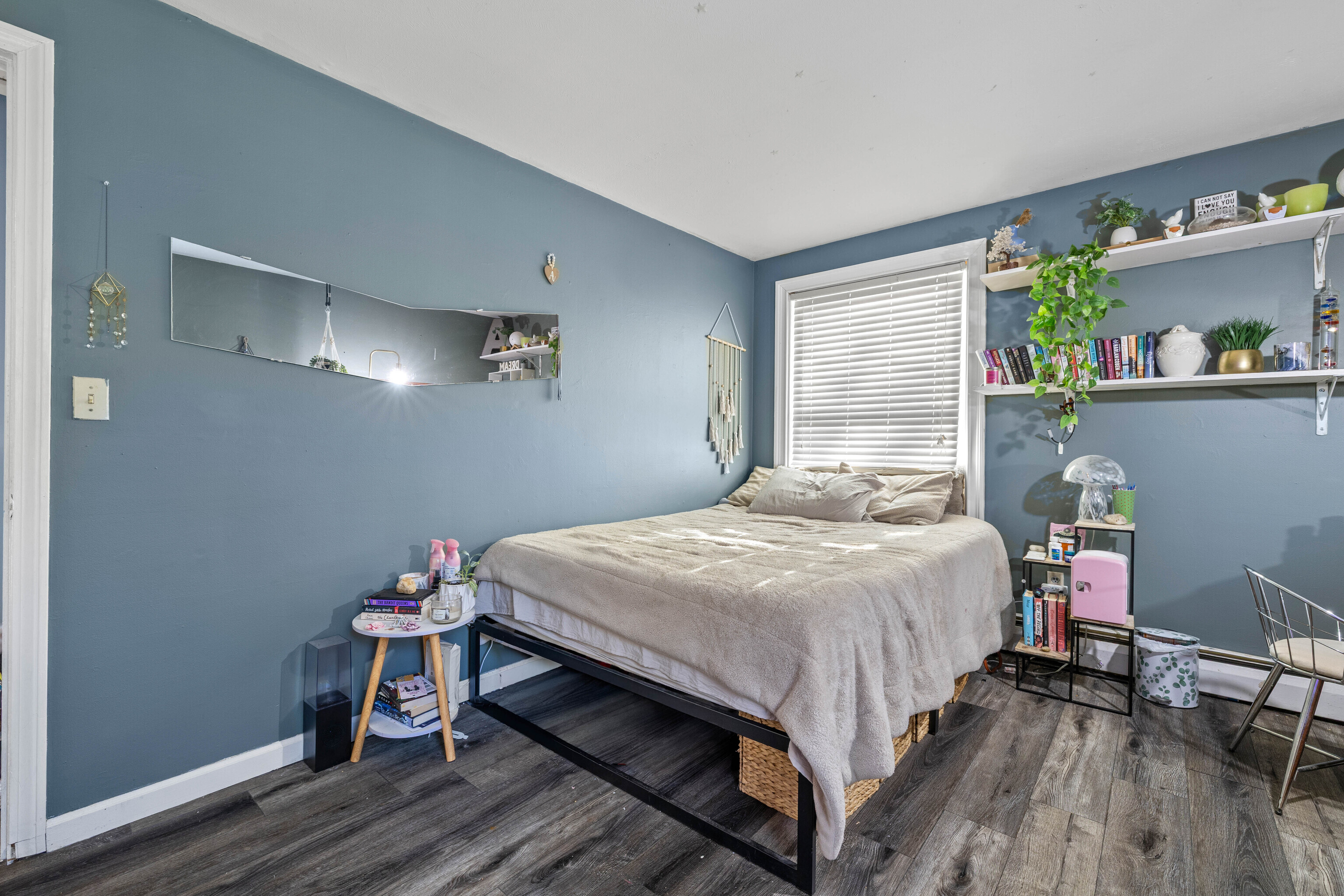 4 Van Dyke Lane Clinton, CT 06413 - Photo 19 of 38 a bedroom with a bed and a table in it