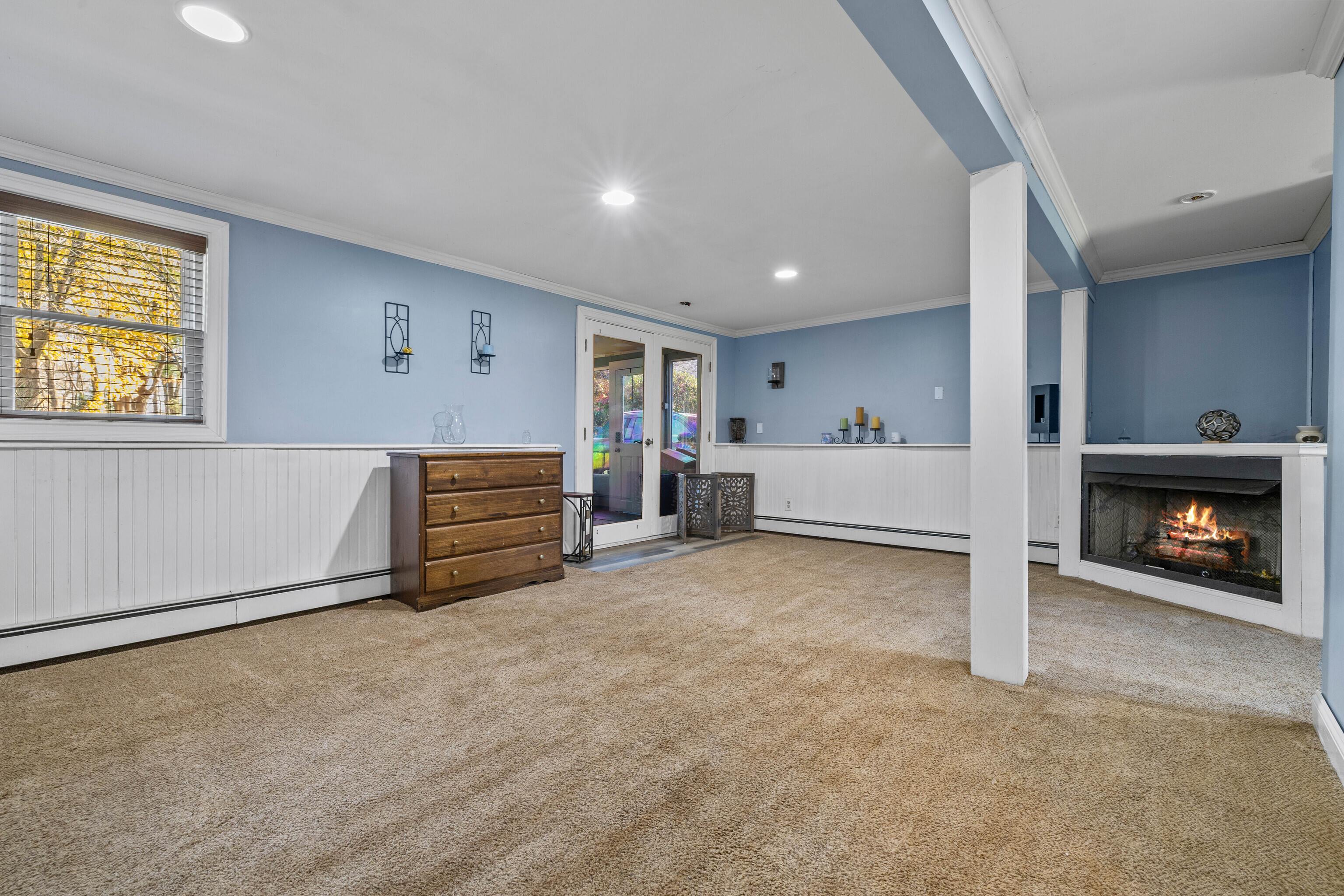 4 Van Dyke Lane Clinton, CT 06413 - Photo 26 of 38 a living room with furniture and a fireplace