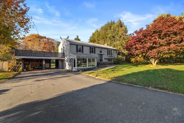 a view of a house with a swimming pool