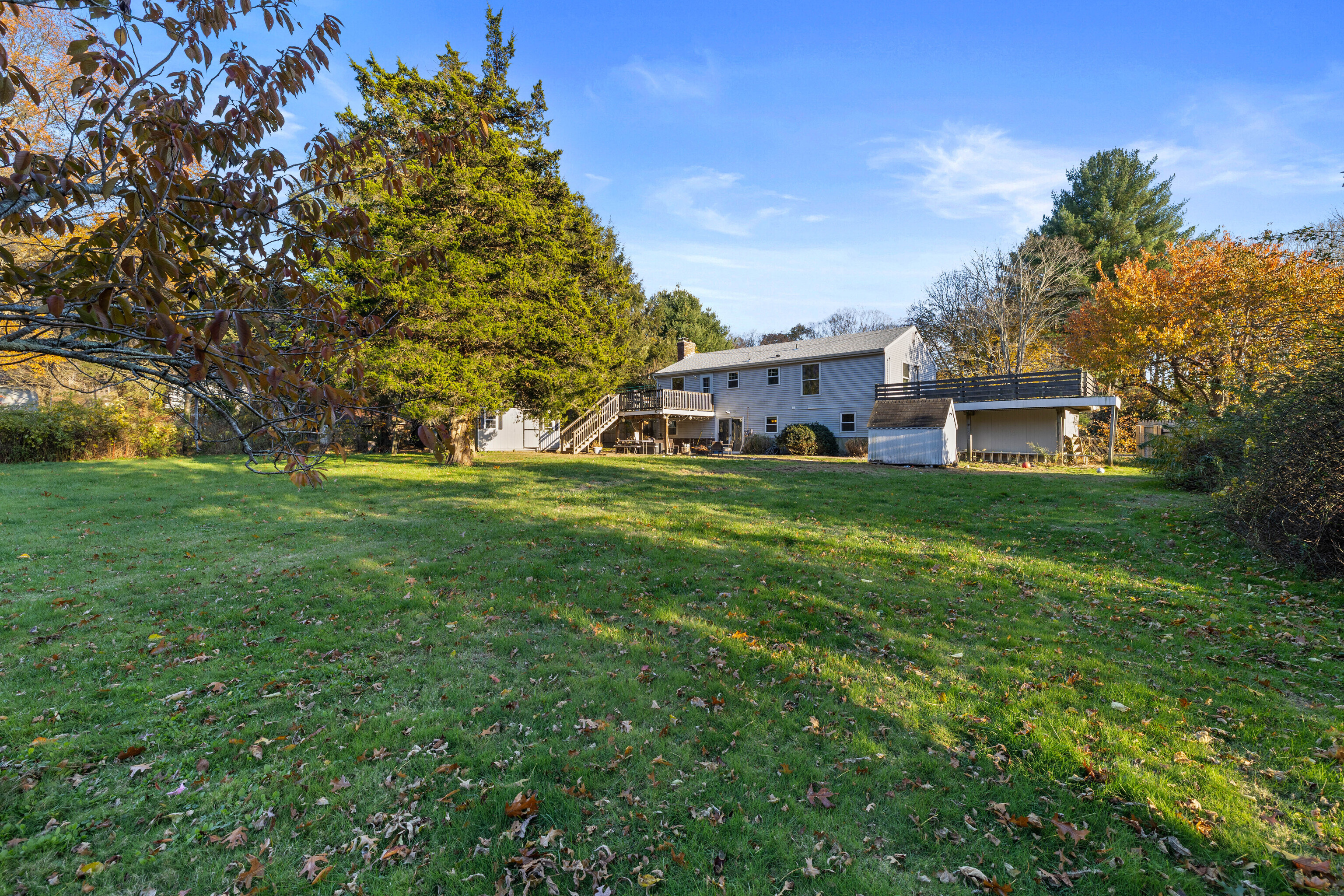 4 Van Dyke Lane Clinton, CT 06413 - Photo 34 of 38 a view of a house with a big yard