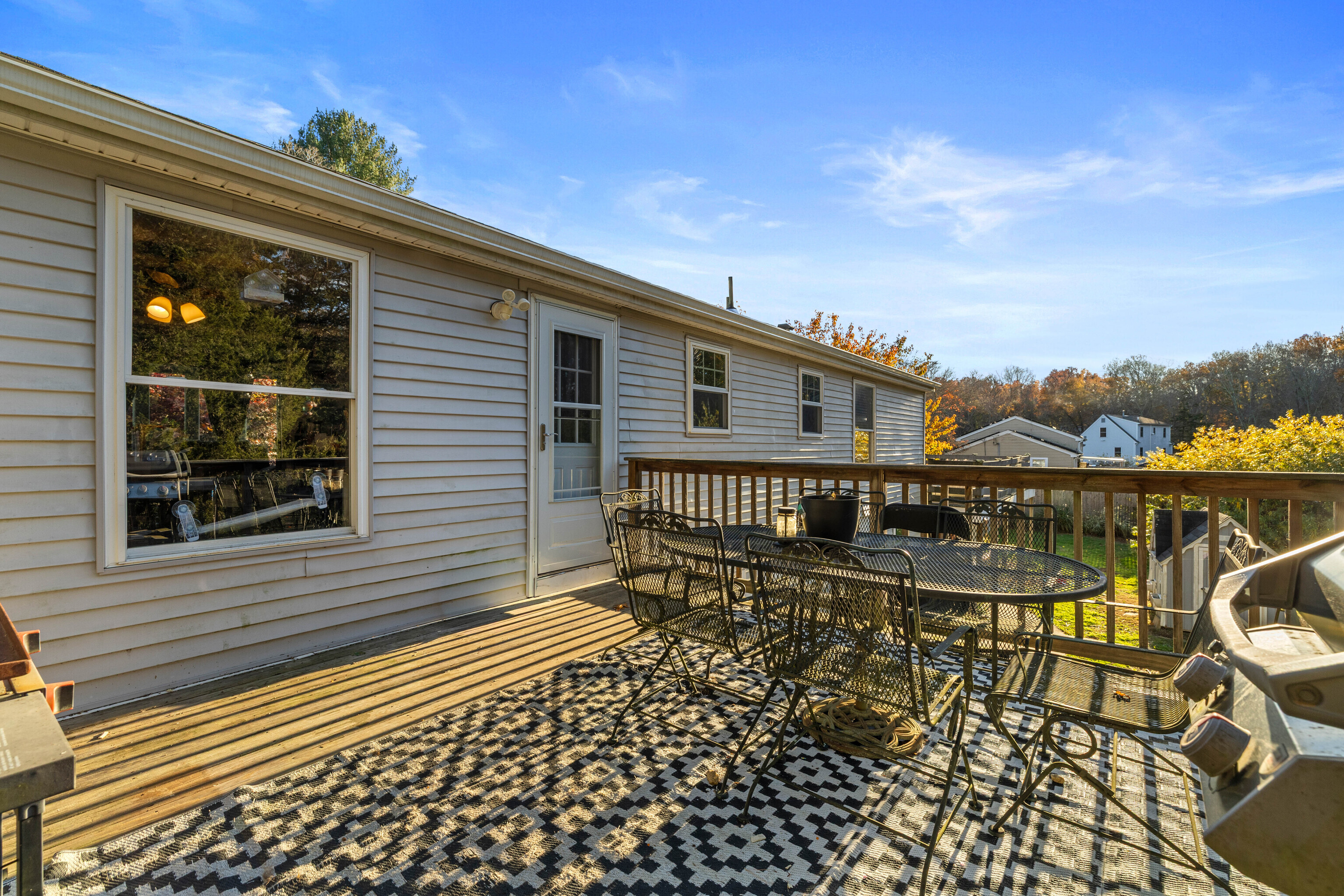 4 Van Dyke Lane Clinton, CT 06413 - Photo 36 of 38 a balcony with a bench