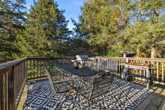 a view of balcony with furniture
