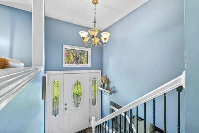 a view of a dining room with wooden door