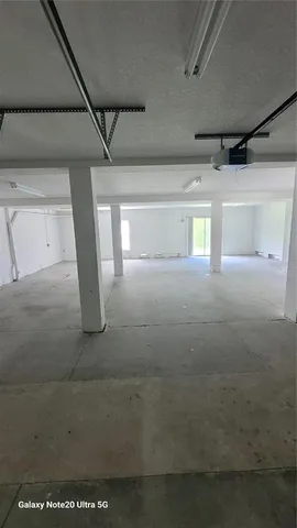 a view of balcony with wooden floor