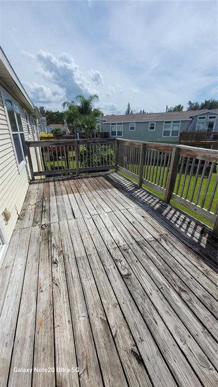 4936 Marina Palms Drive Port Richey, FL 34668 - Photo 17 of 19 a view of balcony with wooden floor