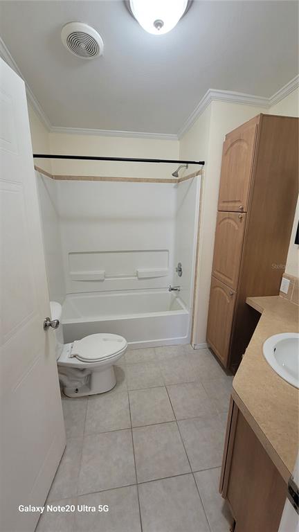 4936 Marina Palms Drive Port Richey, FL 34668 - Photo 8 of 19 a bathroom with a toilet and a shower