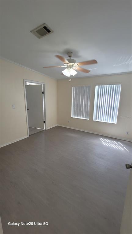 4936 Marina Palms Drive Port Richey, FL 34668 - Photo 10 of 19 a view of an empty room with a window