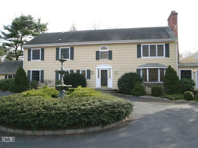 1060 Westover Road Stamford, CT 06902 - Photo 1 of 1 a front view of a house with a yard