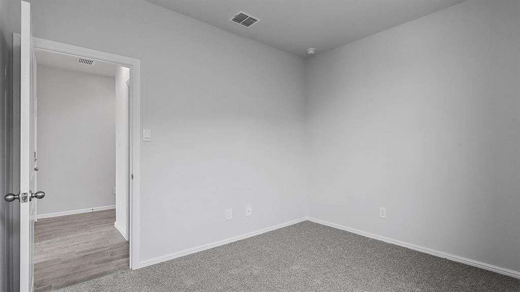 140 Trinity Street Grandview, TX 76050 - Photo 24 of 39 a view of an empty room