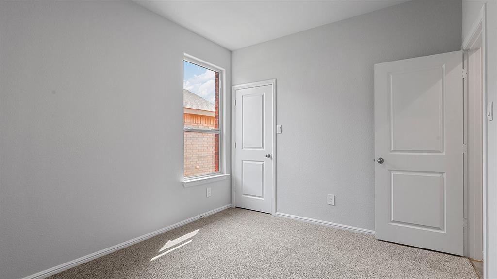 140 Trinity Street Grandview, TX 76050 - Photo 26 of 39 a view of an empty room and window