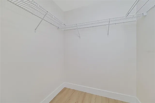 a view of a room with racks on the wall