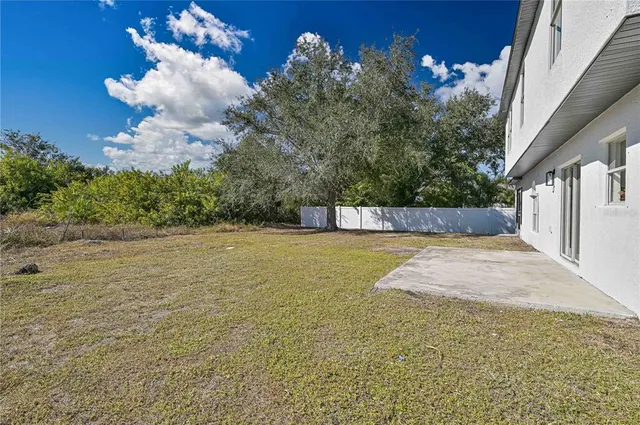 an aerial view of residential building with outdoor space