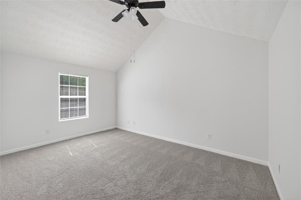 1424 Steam Engine Way Northeast Conyers, GA 30013 - Photo 18 of 32 a view of a livingroom with a window