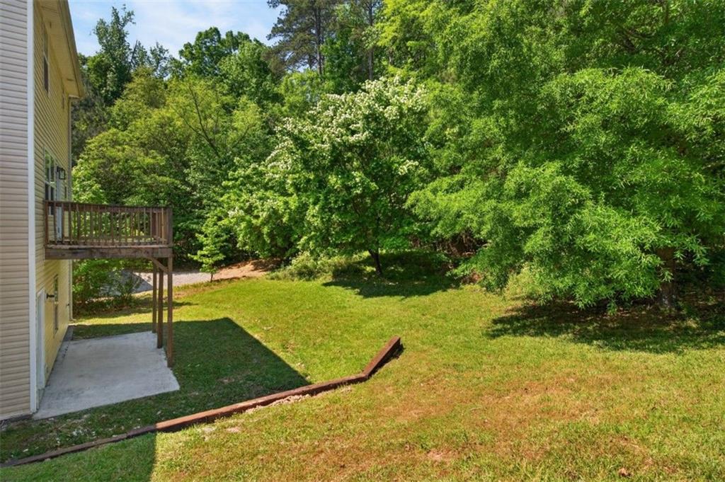 1424 Steam Engine Way Northeast Conyers, GA 30013 - Photo 28 of 32 a view of a backyard