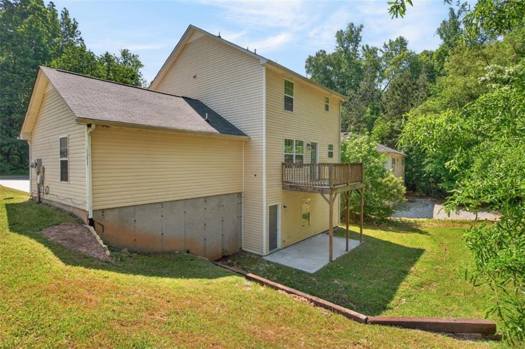 1424 Steam Engine Way Northeast Conyers, GA 30013 - Photo 29 of 32 a backyard of a house