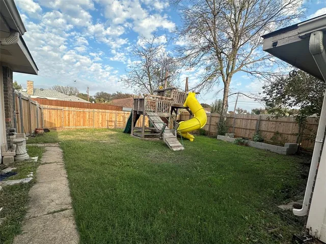 a view of a park with slide