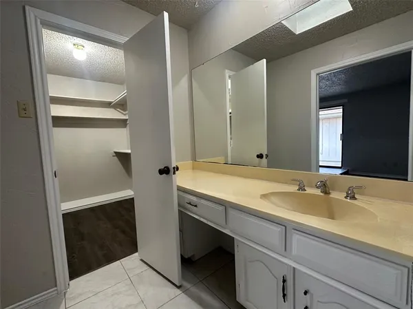 a bathroom with a toilet a sink and bathtub