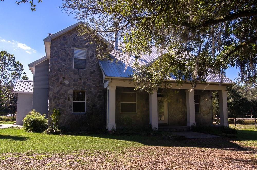 1411 South Wiggins Road Plant City, FL 33566 - Photo 1 of 1 Exterior front (northeast).