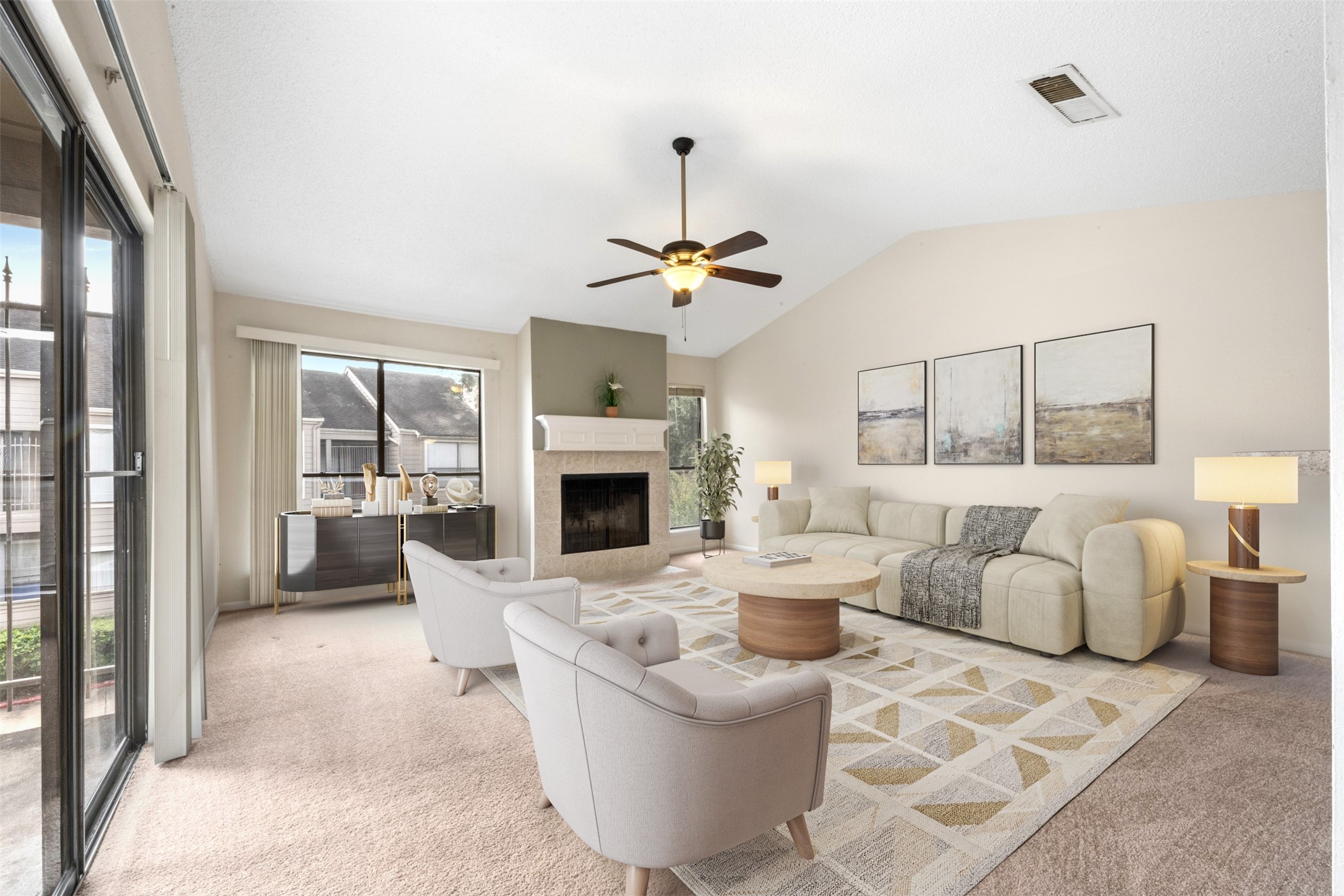 a living room with furniture and a fireplace
