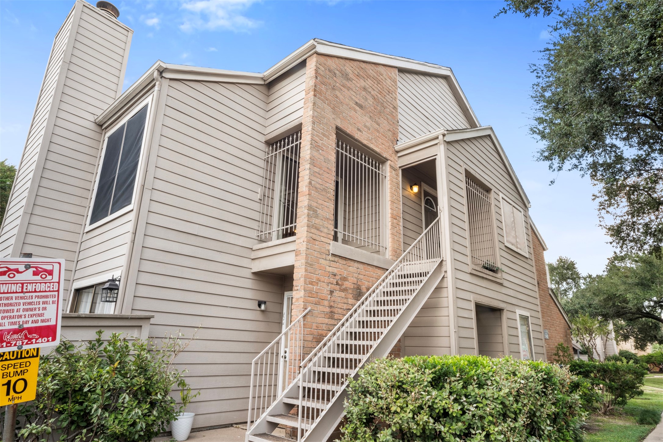 6701 Sands Point Drive, Unit 61 Houston, TX 77074 - Photo 17 of 20 a front view of a house