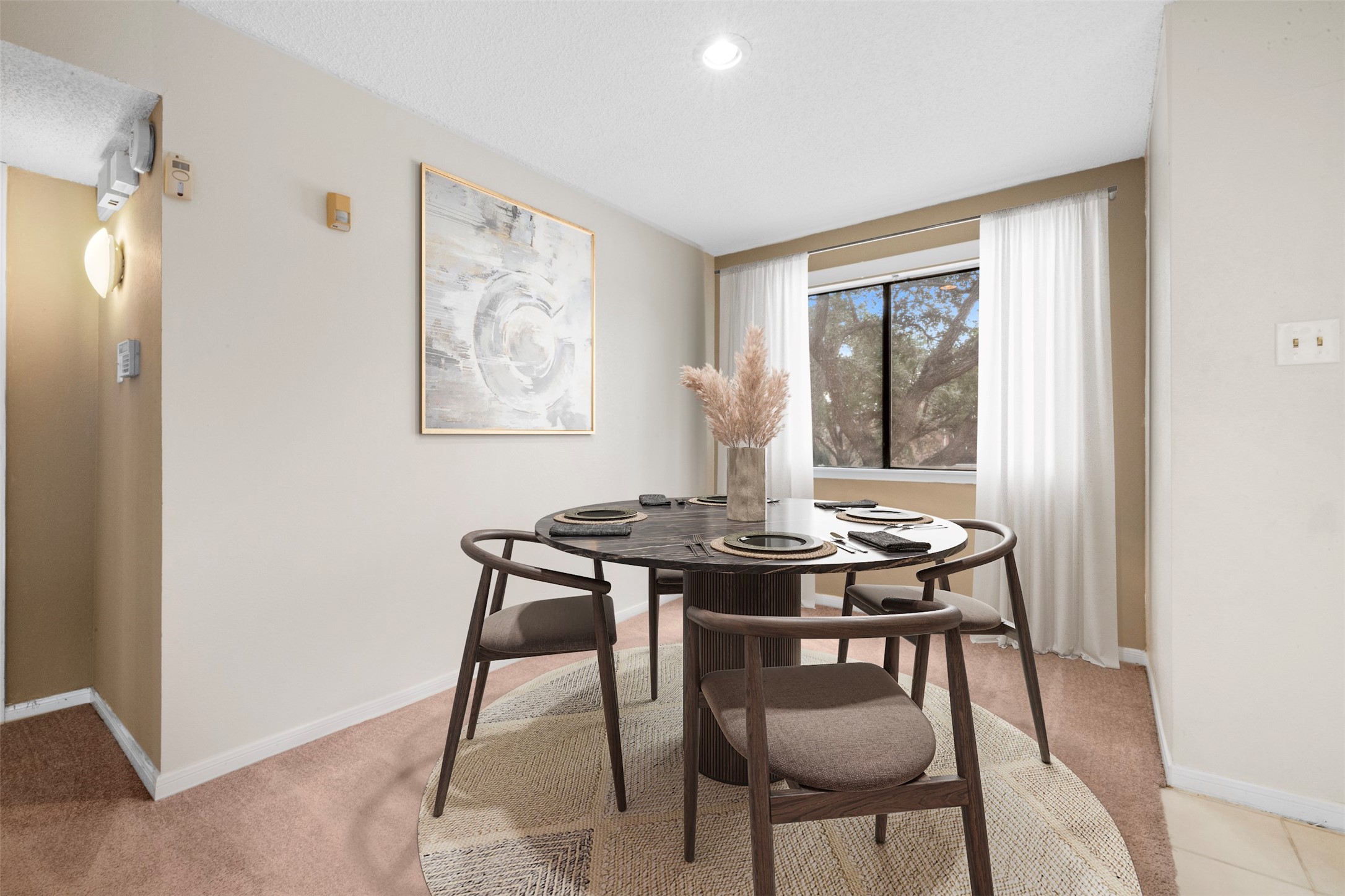 6701 Sands Point Drive, Unit 61 Houston, TX 77074 - Photo 7 of 20 a view of a dining room with furniture and wooden floor