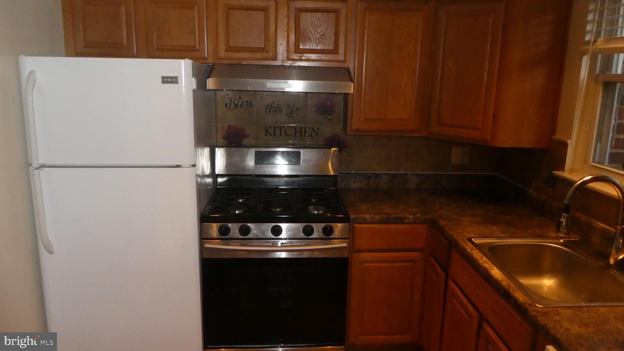 1921 Addison Road South District Heights, MD 20747 - Photo 7 of 32 Spacious Kitchen