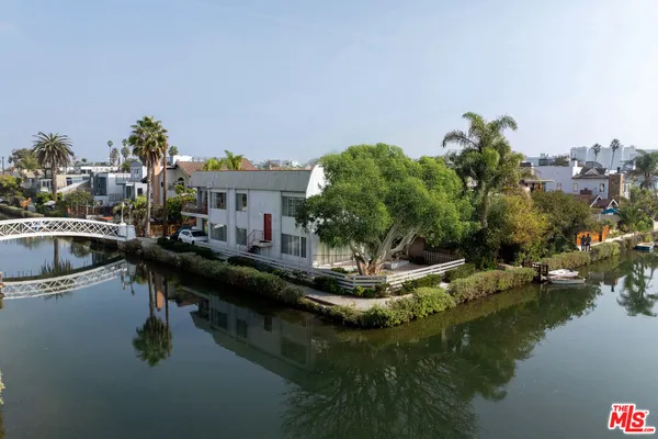 a view of a lake with a house