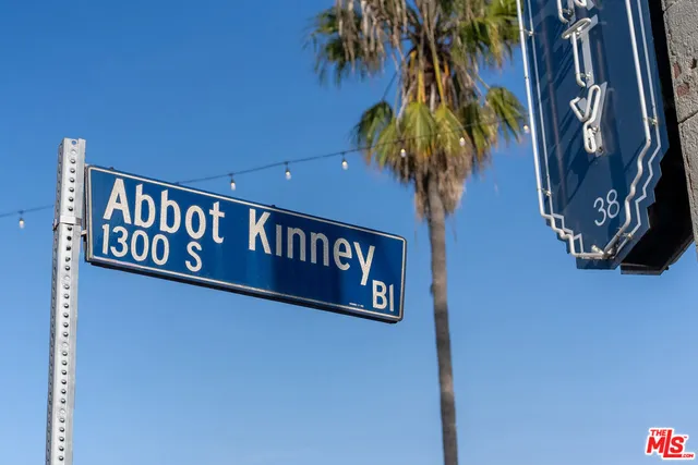 a street sign that is on a wall