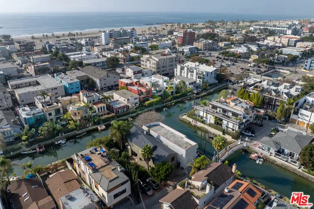 an aerial view of a city with lots of residential buildings