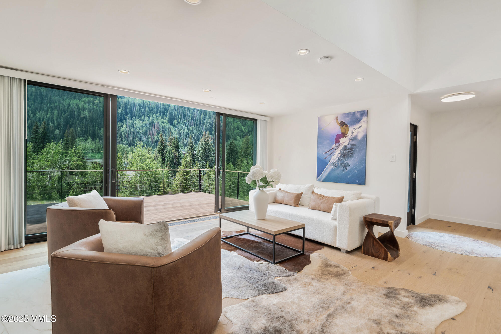 4545 Big Horn Road Vail, CO 81657 - Photo 9 of 49 a living room with furniture and a large window