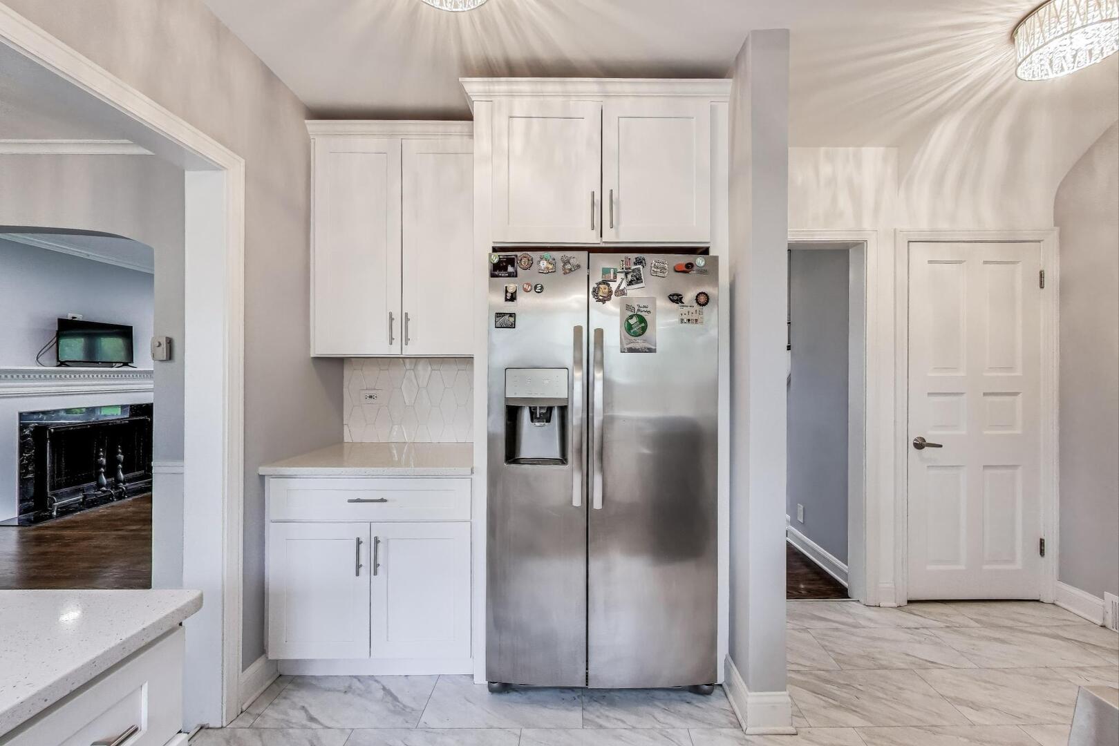 2515 Gordon Drive Flossmoor, IL 60422 - Photo 13 of 42 a kitchen with stainless steel appliances a refrigerator sink and cabinets