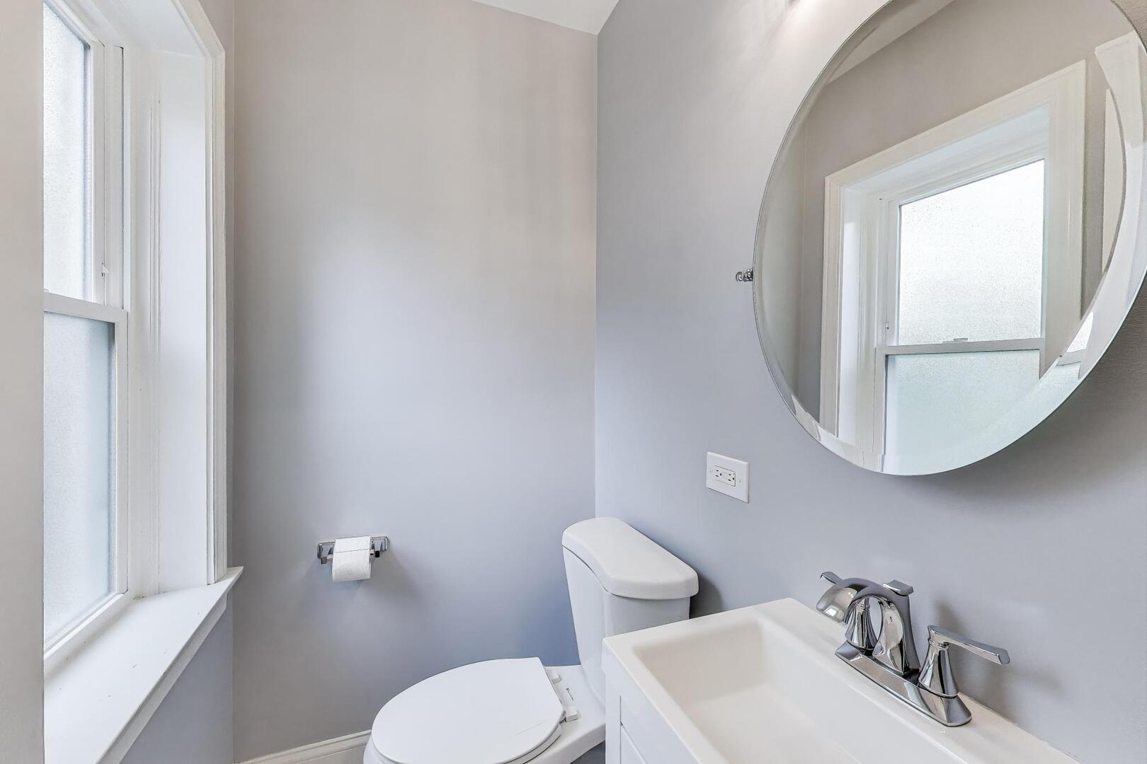 2515 Gordon Drive Flossmoor, IL 60422 - Photo 19 of 42 a white toilet sitting next to a bathroom sink