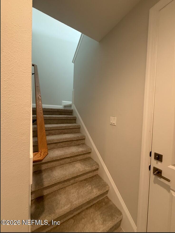 15 Mulberry Road Palm Coast, FL 32164 - Photo 17 of 22 Garage Entry - Stairs to Loft & BDRM - B