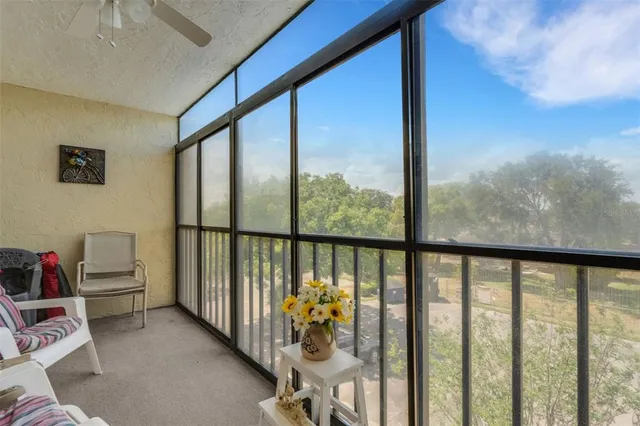 a view of a porch with furniture