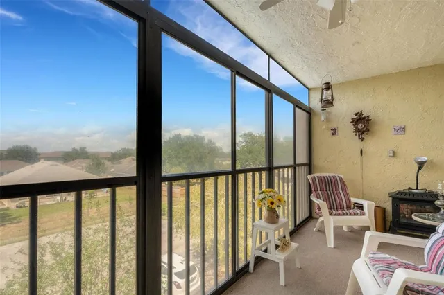 a balcony with furniture