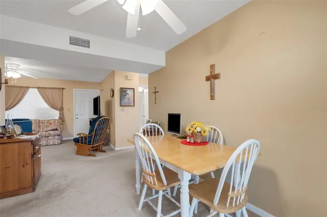 a view of a dining room with furniture
