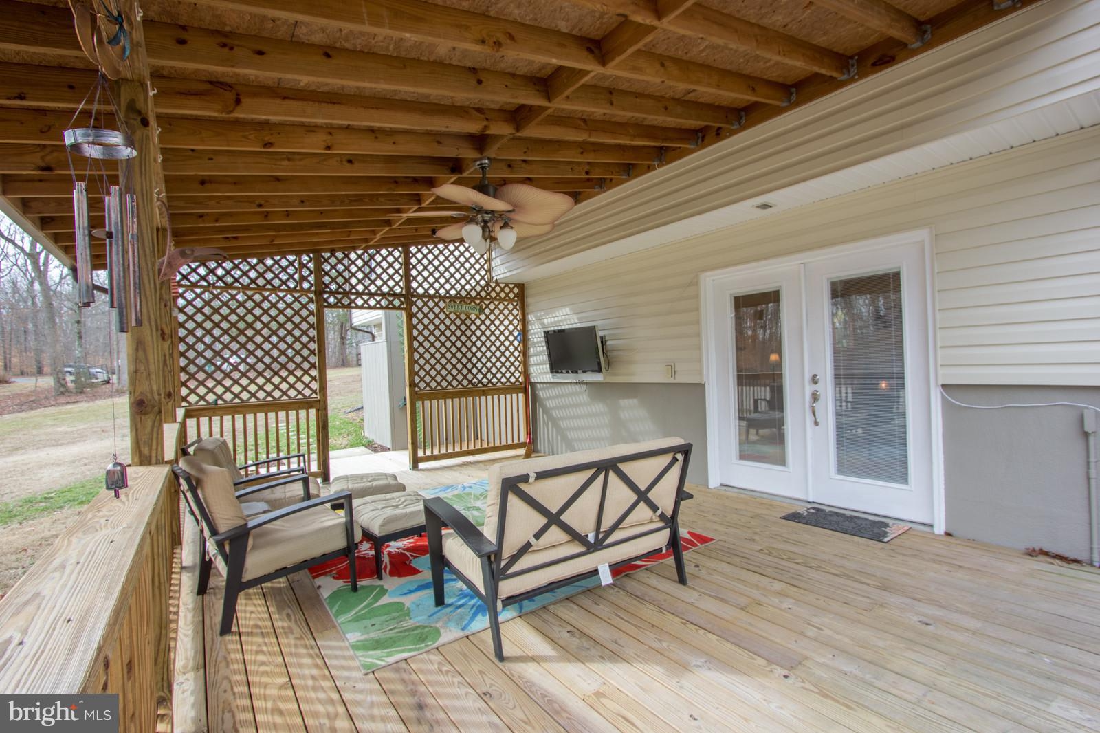 491 Cropp Road Fredericksburg, VA 22406 - Photo 26 of 30 Covered Deck with Flat Screen TV
